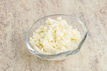 Grained cottage cheese in the bowl