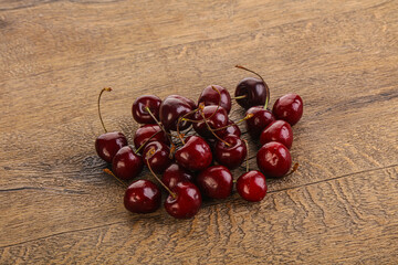 Ripe sweet cherry berries heap