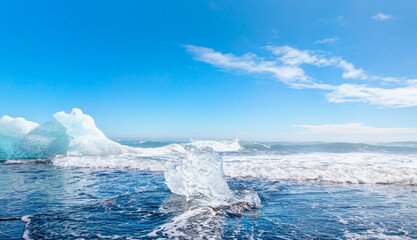 Iceberg pieces on diamond beach near Jokulsarlon lagoon - Iceland