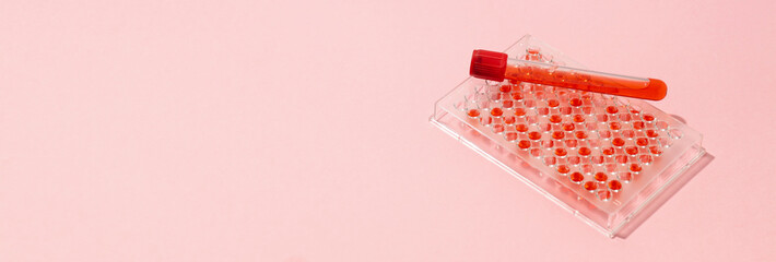 Concept of laboratory accessories on pink background