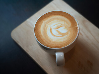 latte coffee cup  on wood tray