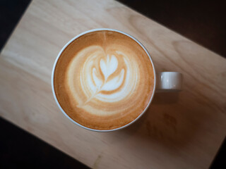 latte coffee cup  on wood tray