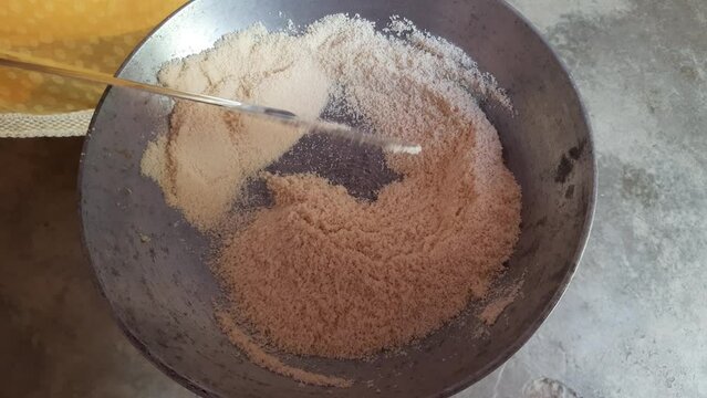 Make Sooji halawa in pan. Its other names rava halwa. Its make Sooji an sugar. Homemade and eaten during festival. Festival sweet dish. Delicious sweets of India.