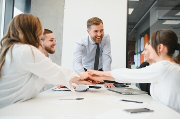 Corporate business team and manager in a meeting room at modern office with panoramic windows. Business concept