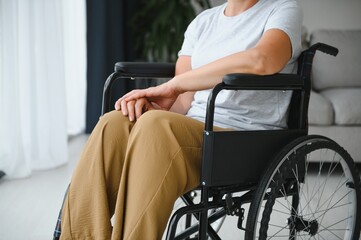 Obraz premium Senior woman on a wheelchair
