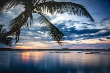 Fototapeta premium Long exposure: Porto Seguro Beach at dawn with palm trees, BAHIA