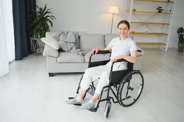 Brunette woman working out on wheelchair at home
