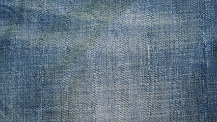 Blue jeans fabric background texture. Close up view.