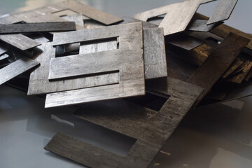 Pile of Ferromagnetic metal core for high energy efficient transformer.  Selective focus, shallow...