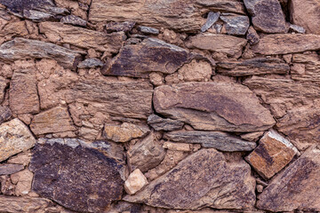 Grunge background of vintage stone brick wall texture photo
