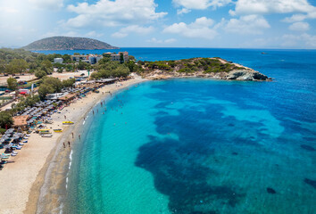 Obraz premium Aerial view of the popular Mavro Lithari beach at Saronida, Attica, Greece