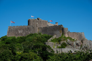 Obraz premium The fortress Mont Orgueil Castle at Gorey harbour, Jersey, Channel Islands, British Isles.
