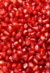 Fresh ripe pomegranate. Macro with shallow depth of field.