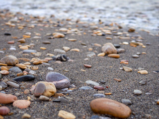 pebbles on the beach at sunset
