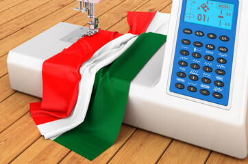Sewing machine with Hungarian flag on the wooden table. 3D rendering