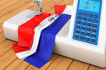 Sewing machine with Paraguayan flag on the wooden table. 3D rendering