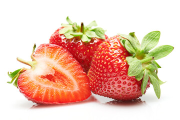 strawberries isolated on white background, red berries whole and sliced in details, concept of...