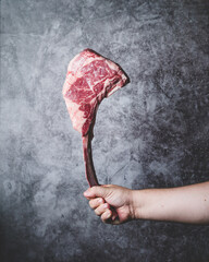Tomahawk axe shaped piece of meat