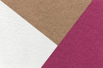 Texture of craft white, wine and brown shade color paper background, macro. Vintage abstract purple cardboard