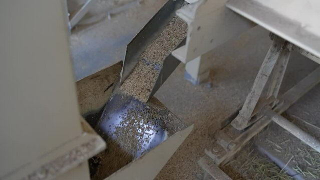 Production plant with rice mill machine during working process in slow motion