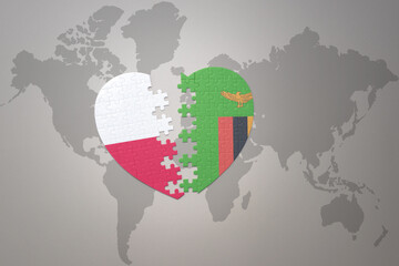 puzzle heart with the national flag of zambia and poland on a world map background.Concept.
