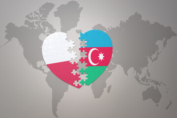 puzzle heart with the national flag of azerbaijan and poland on a world map background.Concept.
