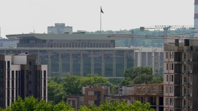 Minsk, Belarus. June 27, 2022. View of the city on a hot day. In the center through the smog and evaporating trembling air, you can see the Independence Palace - is an official residence of Lukashenko