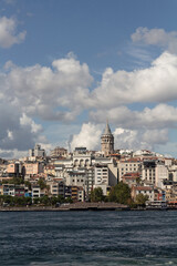 Naklejka premium View of Galata tower and Beyoglu district on the European side of Istanbul. It is a sunny summer day.