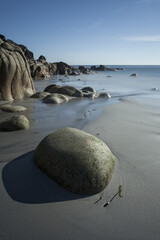 Porth Nanven Cove near St Just in Cornwall also known as the Dinosaur egg beach after its large rounded rocks