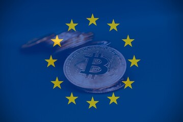 European flag with Bitcoin in the center .