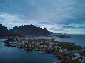 Reine, Lofoten, Norway. The village of Reine, blue sky, with the typical rorbu houses.