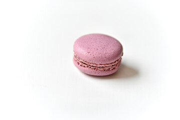 Delicious multicolored almond cookies isolated on a white background. Sweet multicolored macaroons.