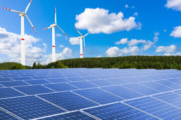 Renewable sources of electricity. Eco-friendly power plants. Landscape with solar panels. Windmills...