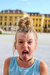 Little girl child playing in the park, walking in Vienna.