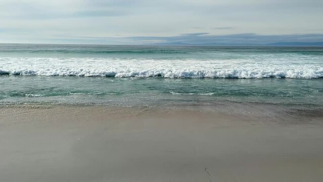 17 mile Drive Spanish bay in Monetery, California. Blue ocean waves hitting rocks at Seal Rock Beach