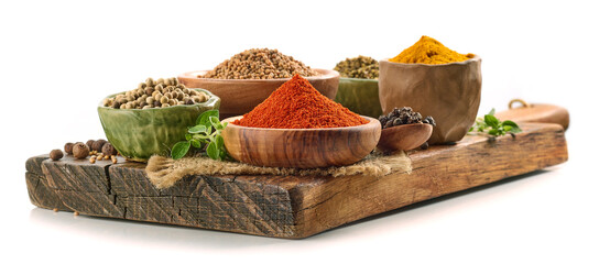 various spices on wooden board