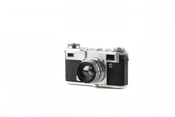 Old vintage rangefinder film camera on white background.