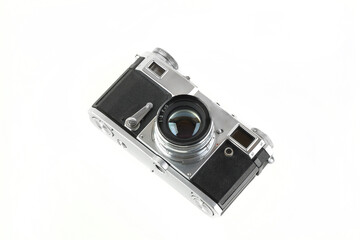 Old vintage rangefinder film camera on white background.