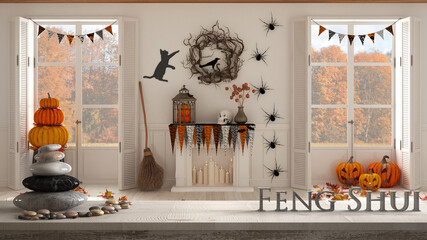 Wooden vintage table shelf with pebble balance and 3d letters making the word feng shui over Halloween living room with fireplace and autumnal landscape, zen concept interior design