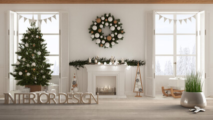 Wooden table, desk or shelf with potted grass plant, house keys and 3D letters making the words interior design, over Christmas living room project concept copy space background