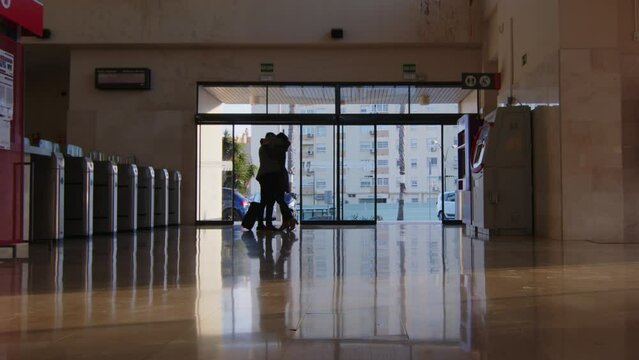 4K - Couple meeting again at the train station after a long time - Happy, emotional couple. reunions of life
