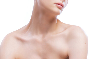 Obraz na płótnie Canvas Close up female neck, collarbones isolated on white studio background. Natural beauty, fitness, diet, spa, plastic surgery and aesthetic cosmetology