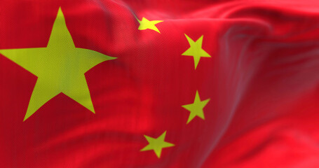 Close-up view of the Chinese national flag waving in the wind