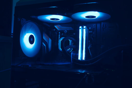 Gaming PC computer with RGB lightning with cool blue tones in a glass case
