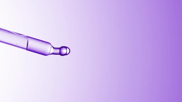 Vertical view macro shot of transparent drops are falling down from lab dropper on purple background | Abstract skincare lotion ingredients mixing concept