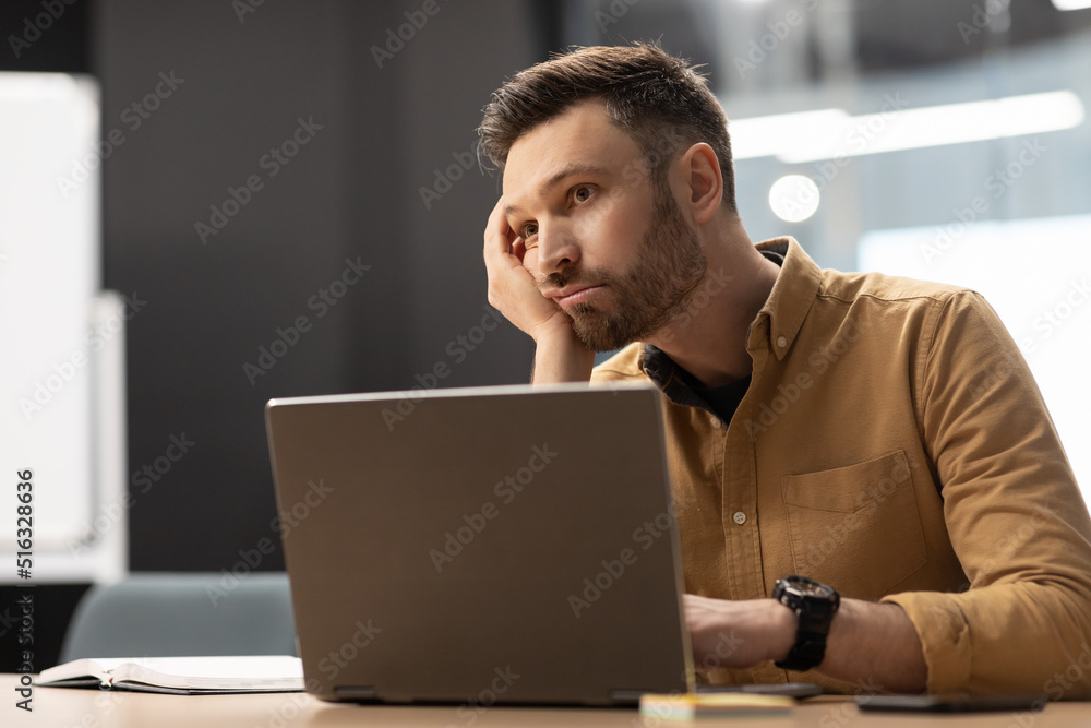 Sticker Unhappy Business Man Sitting Bored Near Laptop In Modern Office