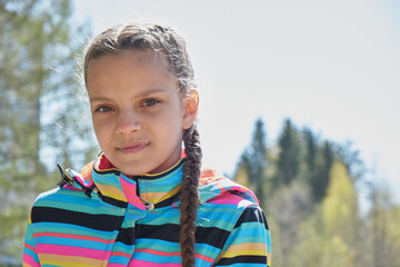 portrait of Cute teenage Girl blue sky background
