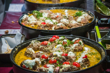 Meatball curry on display at Brick Lane street market in London, England