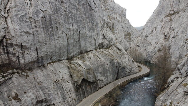 road next to the river Tor&iacute;o in the gorges of Vegacervera in the province of leon, spain