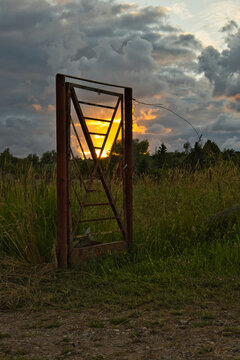 sunset over the fence